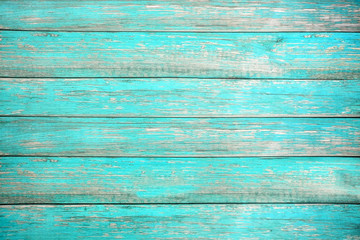 Vintage beach wood background - Old weathered wooden plank painted in turquoise or blue sea color....