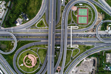 Aerial view transport junction road with satadium green park