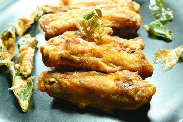 crispy fried chicken wing with lemon grass on plate