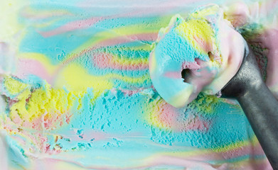 Closeup scooping ice cream Rainbow colorful, Top view Blank for design..