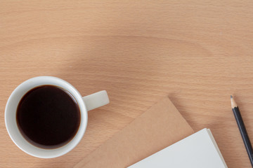 cup of coffee on wooden table