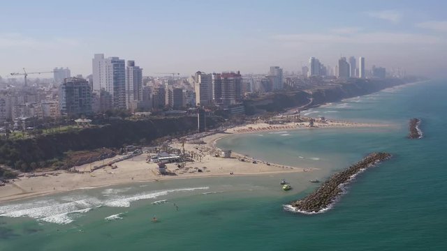 Flying above Natanya promenade area, Israel, 4k drone aerial skyline view 
