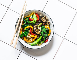 Stir fry vegetables in asian style. Quickly roasted wok vegetables - bok choy, eggplant, bell...
