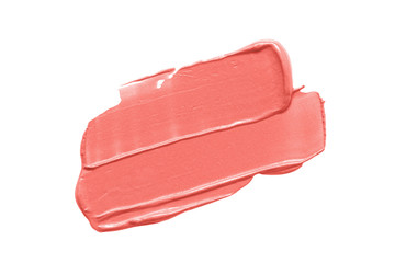 Coral make up swatch. Lipstick smear smudge stroke isolated on white background.