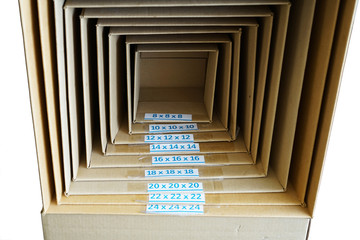 different size of package cardboard boxes stacking together