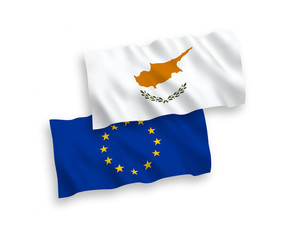 National vector fabric wave flags of European Union and Cyprus isolated on white background. 1 to 2 proportion.