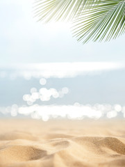 Sand with blurred Palm and tropical beach bokeh background, Summer vacation and travel concept. Copy space - obrazy, fototapety, plakaty