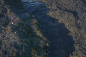 The river between the mountains in a sunny day, 3d rendering