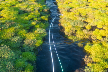 The river between the mountains in a sunny day, 3d rendering