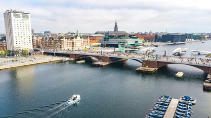 Fototapeta na wymiar Marathon running race, aerial view of many runners on bridge from above, road racing, sport competition, Copenhagen marathon, Denmark