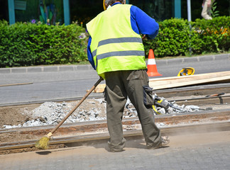Man is working at the railroad construction