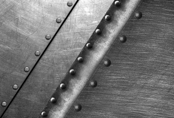 Brushed metal construction steel rivets