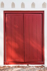 Red old style wooden door