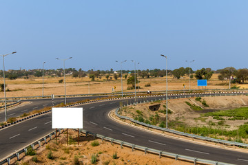 Highway curve road in bright sunny day
