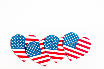 American Independence day background with blue, white and red mixed stars and hearts. Celebration of American independence day, the 4th of July (the Fourth of July). Holiday concept. With copy space. 