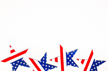 American Independence day background with blue, white and red mixed stars and hearts. Celebration of American independence day, the 4th of July (the Fourth of July). Holiday concept. With copy space. 