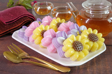 Thai dessert : Layer sweet cake (or Khanom Chan) Thai traditional dessert in beautiful flowers shaped. One of nine famous Thai auspicious desserts in Thailand.