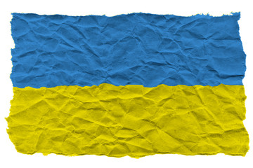 Flag of Ukraine made of crumpled corrugated paper. Crisis concept. Torn paper
