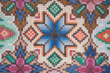 Beautiful handmade carpet, made in the technique of embroidery Bulgarian cross