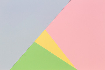 Abstract geometric paper background in light pastel color tones
