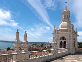 Fototapeta na wymiar On top of the roof of Sao Vicente de Fora in Lisbon in