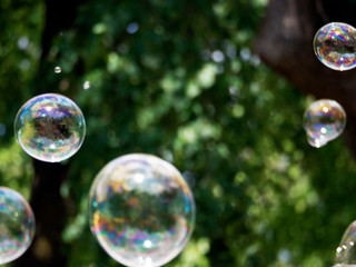 Abstract background with soap bubbles, close up, with reflection