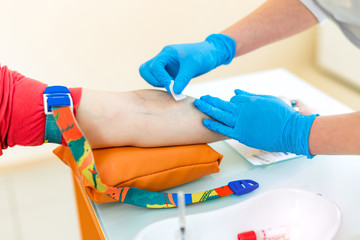 Blood test at the medical examination. Blood sampling. Blood tube for test.