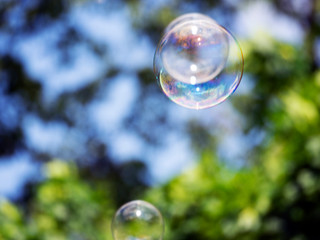 Abstract background with soap bubbles, close up, with reflection