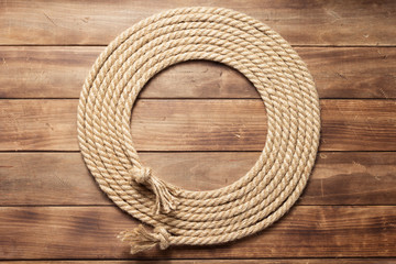 ship rope at wooden background texture