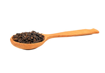 Dry cloves in spoon