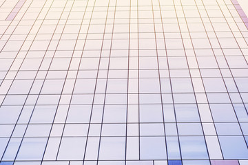 Fototapeta premium Blue toning background with part of a modern business center building