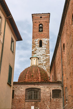 Stone, medieval church with a bell tower in the village of Lukka, Italy.