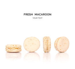 Creative layout made of almond macaroons on the white background. Flat lay. Food concept. 