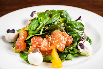 caesar salad with salmon fish