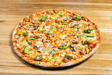 pizza on the wooden background