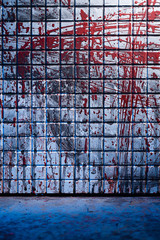 Cold and dark background from the scene of the murder. Dirty marble tile blurred by splashes of red...
