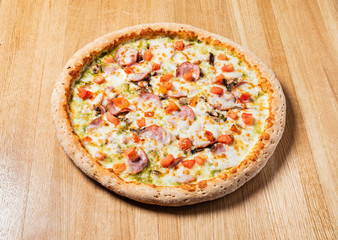 italian pizza on the wooden background