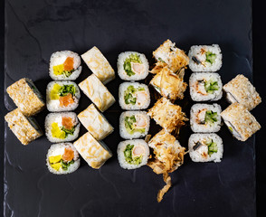 sushi on the black background