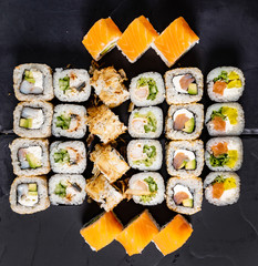 sushi on the black background