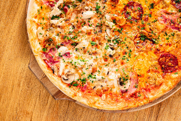 italian pizza on the wooden background