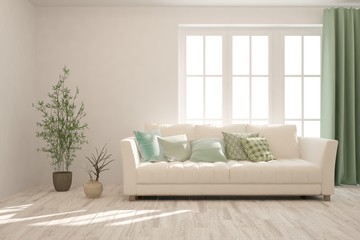 Fototapeta premium Stylish room in white color with sofa. Scandinavian interior design. 3D illustration