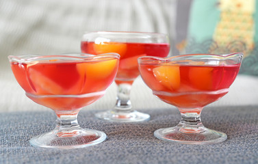 Jelly with fruit in glass bowl