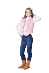 Happy little girl in jeans posing on white background