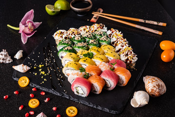 sushi on the black background