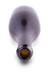 The empty opened  wine bottle isolated on white background