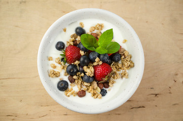 Yoghurt with granola with fresh fruits