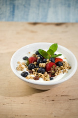 Yoghurt with granola with fresh fruits