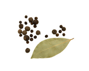 Bay leaf, allspice and pepper isolated on white background