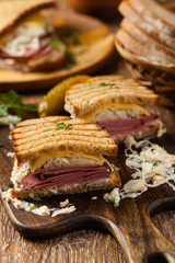 Ruben sandwich. New York sandwich with pastrami, sauce 1000 islands and sauerkraut.