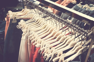 Fototapeta na wymiar Women clothes in shopping mall. Fashion store. Fashion clothes. Women clothing.